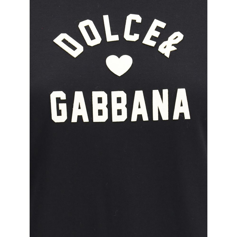 Dolce & Gabbana Black Cotton T-Shirt with logo patch and ribbed crew neck, perfect for casual fashion, AW25 season.
