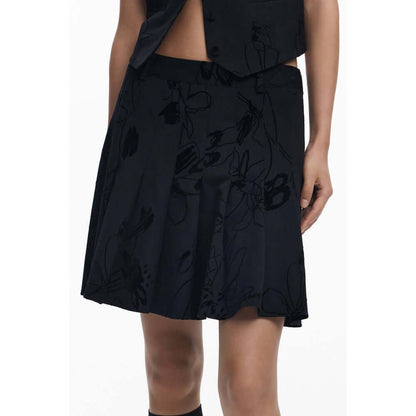 Desigual Black Polyester Women Skirt with audacious flock design and sassy side zipper, flaunting iconic Desigual logo.