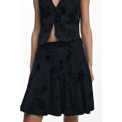 Desigual Black Polyester Women Skirt with bold flock design and side zipper, showcasing a daring fashion statement.