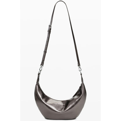 Desigual Bronze Polyethylene Women Handbag with removable shoulder handle and dual adjustable straps.