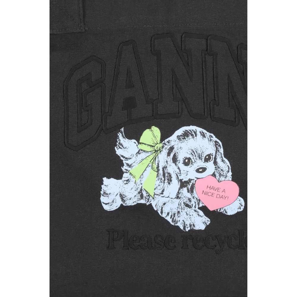 Ganni Black Cotton Shoulder Bag with puppy graphics and embroidered GANNI logo, featuring a "Have a Nice Day" heart detail.