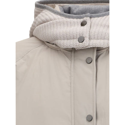 Close-up of Brunello Cucinelli Gray Polyester Coat with button closure and reversible hood showing knit and padded sides.