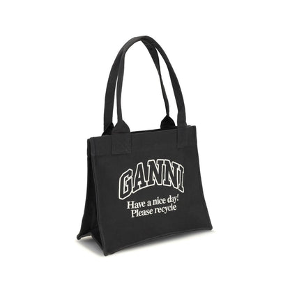 Ganni Black Cotton Shoulder Bag with GANNI logo and 'Have a nice day! Please recycle' message, featuring top handles and roomy interior.