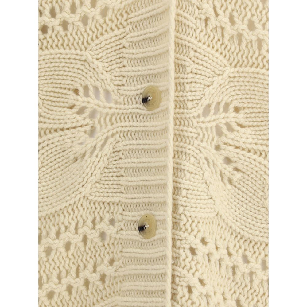 Close-up of Ermanno Scervino Beige Cashmere Cardigan with knit design, showcasing button details and elegant perforated pattern.