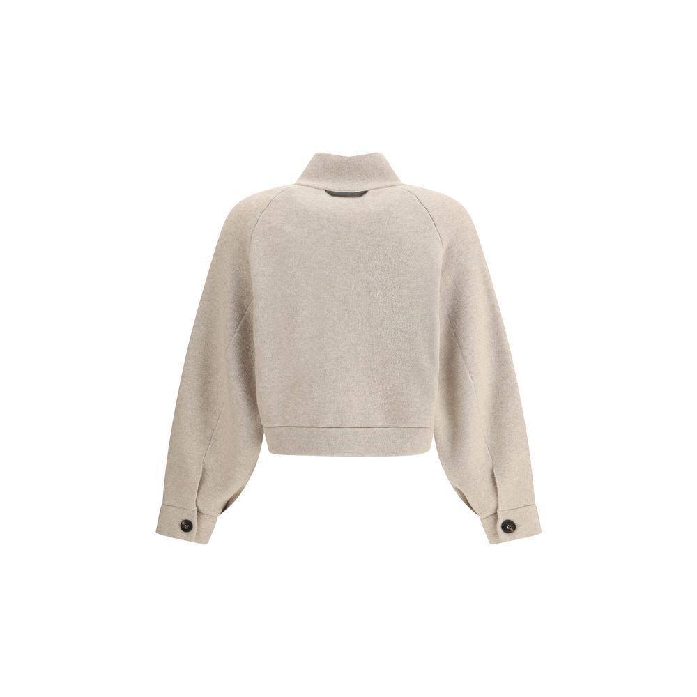 Brunello Cucinelli Beige Cashmere Clothing back view, showcasing buttoned cuff detail and oversized fit for AW25 season.