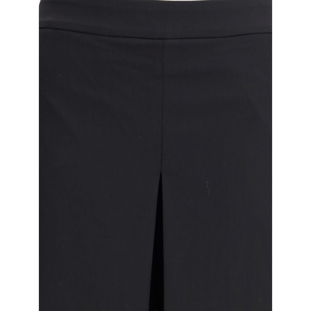 Close-up of Di Stavnitser Black Polyester Casual Pants with wide leg and sleek design.
