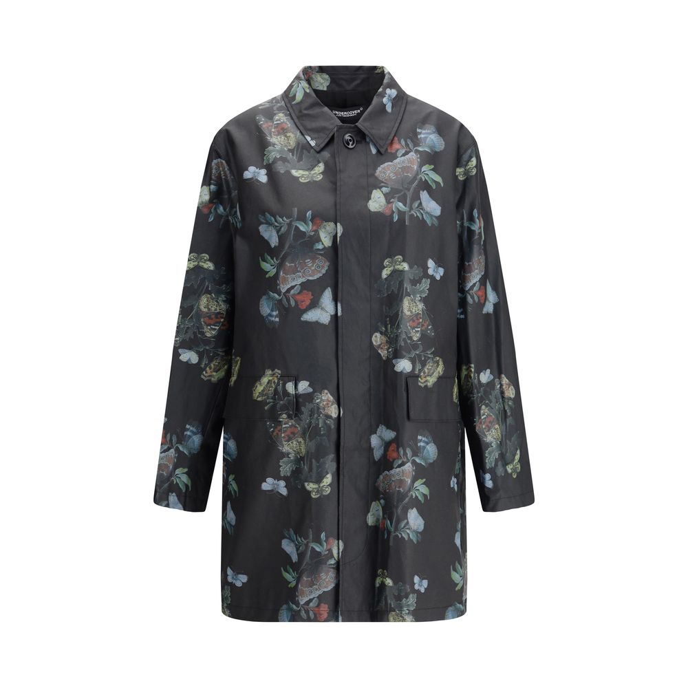 Undercover Black Cotton Coat with floral pattern, featuring waxed cotton, front flap pockets, and cotton lining for versatile style.