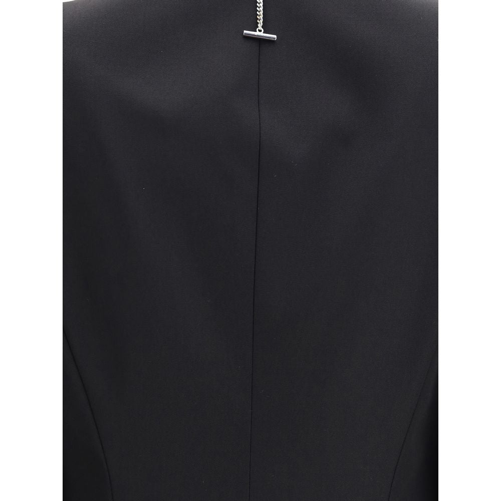 Back view of Alexander McQueen Black Wool Coat showcasing elegant stitching and sleek design details for a refined modern silhouette.