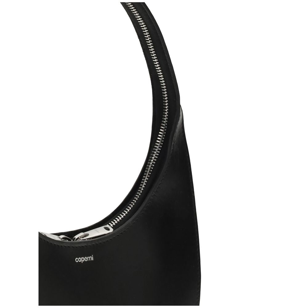 Coperni Black Leather Shoulder Bag with silver-tone zip detailing and embossed logo, features double gusset design with arched handle.