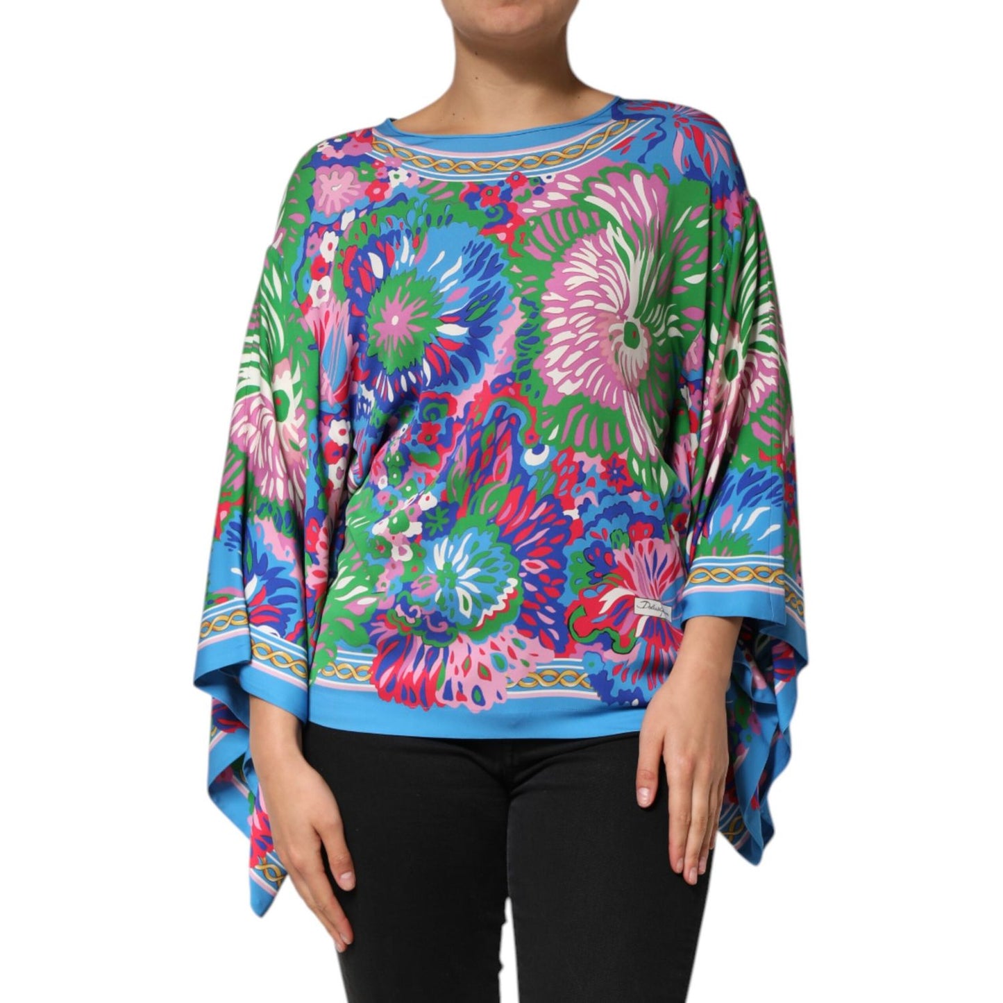 Dolce & Gabbana Multicolor Floral Printed Tunic Blouse Top with vibrant floral design and relaxed silhouette on a model.