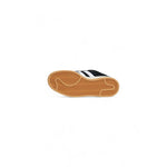 Bottom view of Adidas Black Suede Leather Sneaker showing gum sole and iconic stripes, style HQ8708 for men.