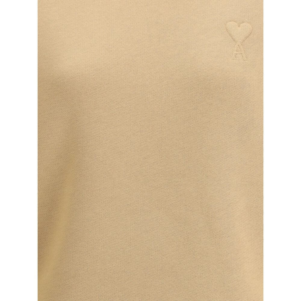 Ami Paris Beige Cotton Sweatshirt with embossed Ami de Coeur logo on chest, offering soft comfort and contemporary style for AW25 season.