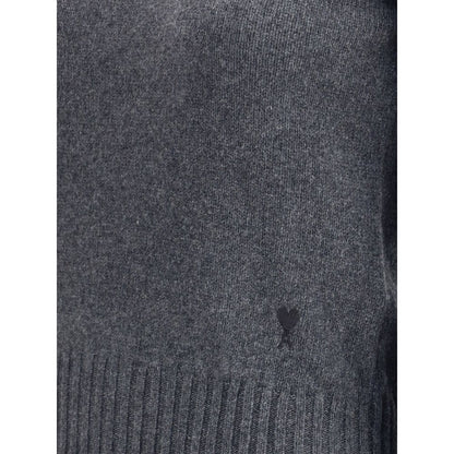 Ami Paris Gray Cashmere Cashmere Sweater with iconic Ami De Coeur logo, featuring ribbed crew neck, hem, and cuffs for timeless appeal.