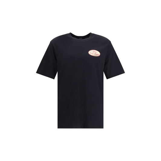 Amiri Station Patch T-Shirt with ribbed crew neck and Amiri monogram on front showcased on plain background.