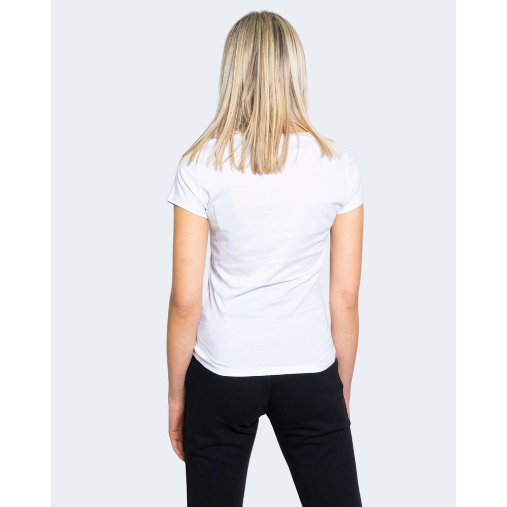 Woman wearing an Armani Exchange White Cotton T-Shirt, short-sleeved, 100% cotton, perfect for casual wear.