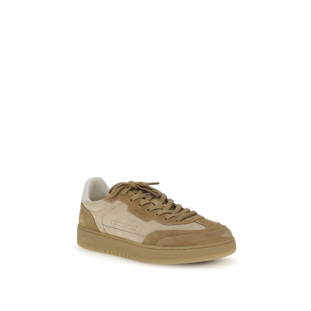 Axel Arigato Beige Leather Low Top Sneakers with suede accents and rubber sole, inspired by retro and urban streetwear designs.