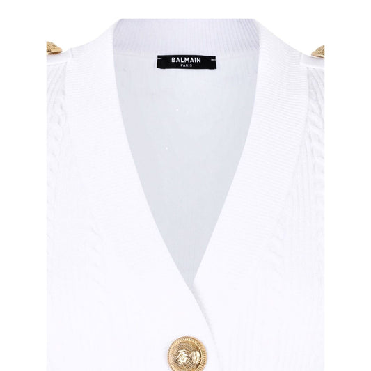 White Balmain Button-Trim Cable-Knit Cardigan with gold buttons and ribbed V-neck detail, featuring shoulder button accents.