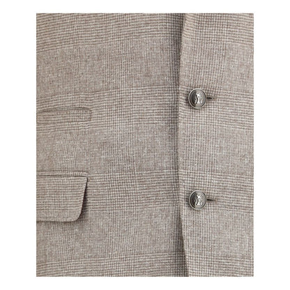 Close-up of Brunello Cucinelli Beige Silk Two-Piece Suit fabric and buttons detail.