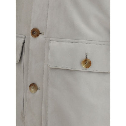 Close-up of Brunello Cucinelli Gray Leather Jacket featuring button closure and flap pockets.