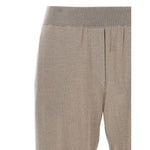 Close-up of Brunello Cucinelli Lurex-detail trousers showcasing taupe grey color with an elasticised waistband and cuffed hems.