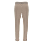 Back view of Brunello Cucinelli Lurex-detail trousers in taupe grey with elasticised waistband and cuffed hems.