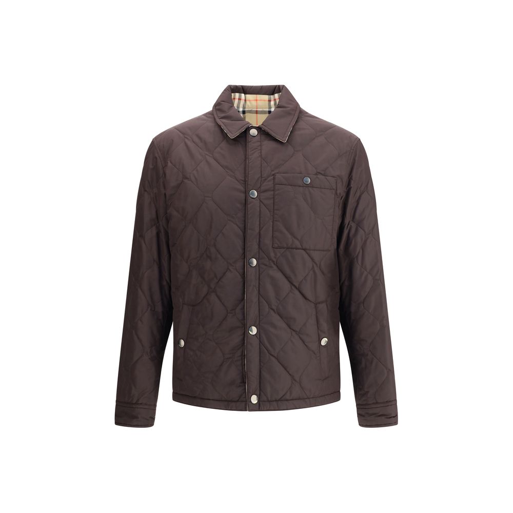 Burberry Brown Polyamide Coat with quilted design, reversible with Burberry Check, featuring snap button closure and pointed collar.