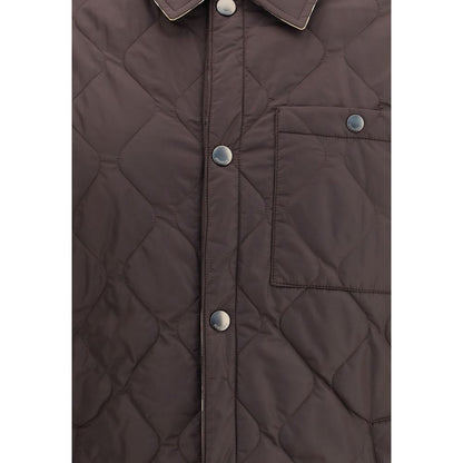 Close-up of Burberry Brown Polyamide Coat featuring quilted nylon design, snap buttons, a chest pocket, and stylish collar detailing.
