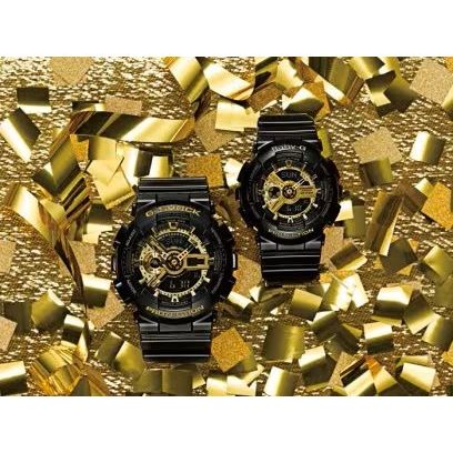CASIO G-SHOCK Mod. GS-BASIC - BLACK ADN GOLD SERIES wristwatch against gold confetti background