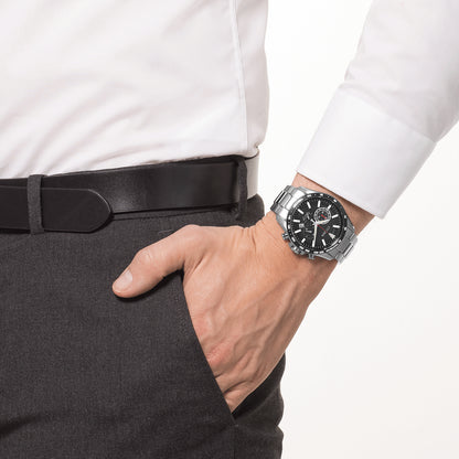 Person wearing CITIZEN Mod. ELEGANCE wristwatch with stainless steel bracelet and black dial.