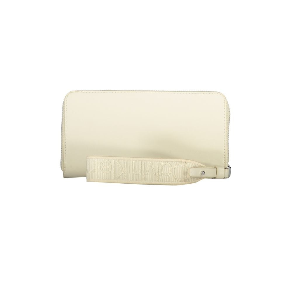 Calvin Klein Beige Polyethylene Wallet with zip closure, 5 compartments, coin purse, card spaces, and removable long pull logo strap.