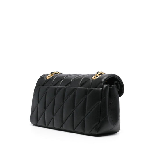 Coach Tabby shoulder bag in black quilted leather with gold-tone hardware and chain-link strap, rear view.
