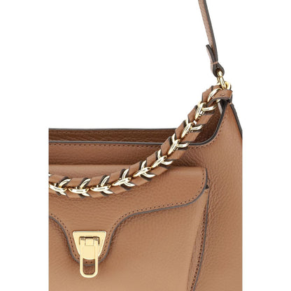 Coccinelle Beige Calf Leather Bos Taurus Shoulder Bag with gold chain and zip closure, featuring a practical front pocket.