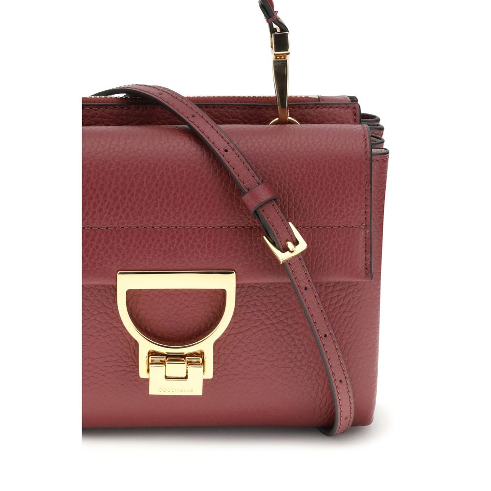 Coccinelle Multicolor Calf Leather Bos Taurus Shoulder Bag with gold-plated interlocking closure and adjustable strap.