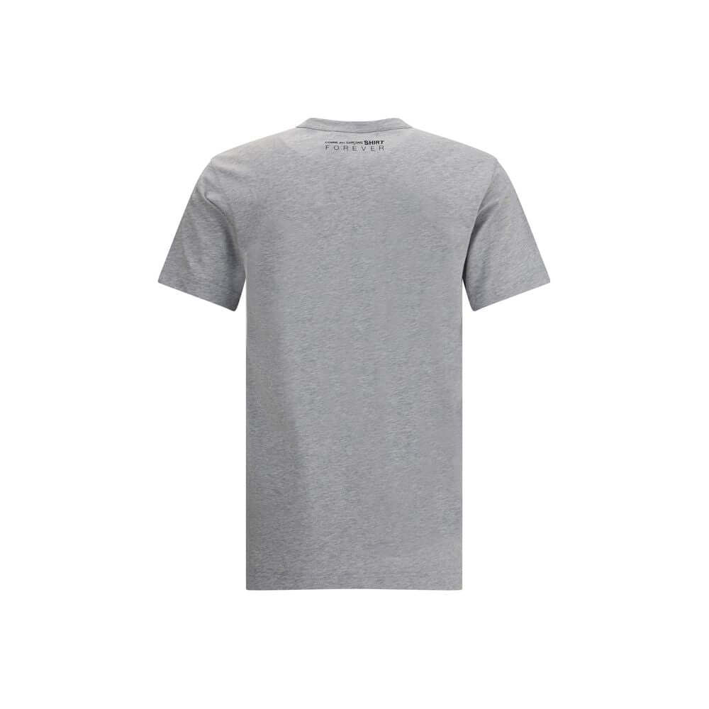 Rear view of Comme Des Garçons Gray Cotton T-Shirt with printed logo, minimalist design, crew neck, and short sleeves, 100% cotton.