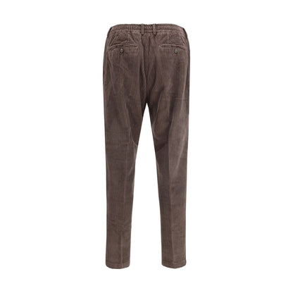 Back view of Cruna Brown Cotton Casual Pants in corduroy with belt loops, showcasing elegant slim fit ideal for autumn and winter seasons.