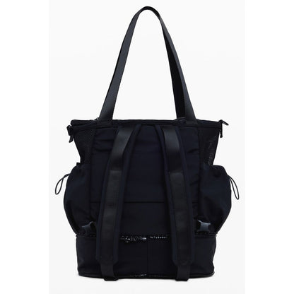Desigual Black Polyester Women Handbag with adjustable straps and pockets, showing versatile design and functionality.