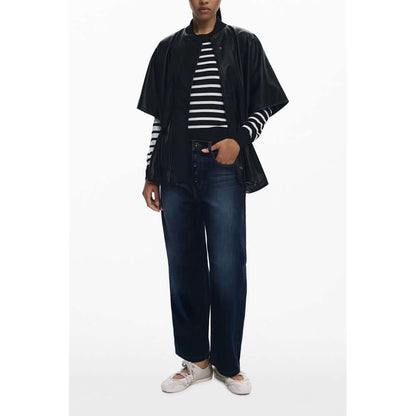 Model wearing Desigual Black Polyethylene Women Poncho with chic design