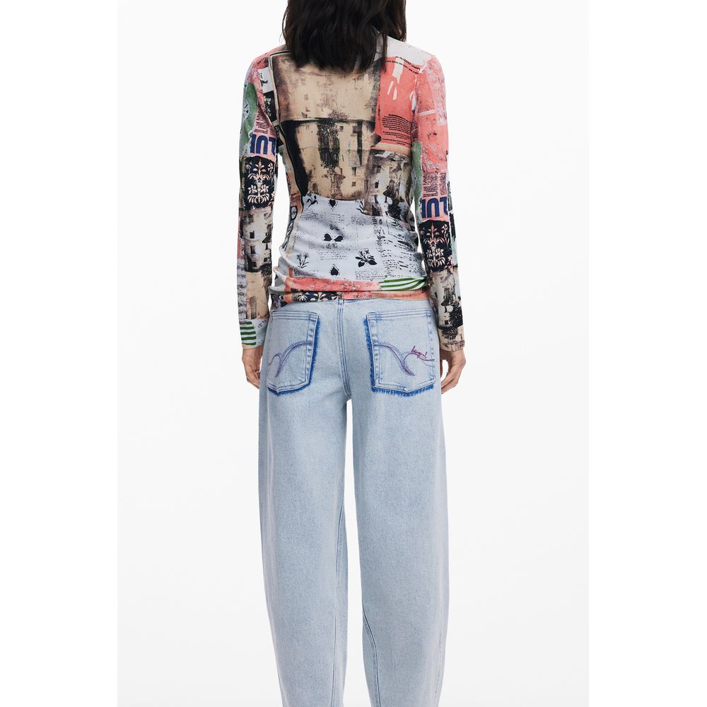 Woman wearing Desigual Pink Viscose Women Sweater with bold patterns and light blue jeans, showcasing unique back design.