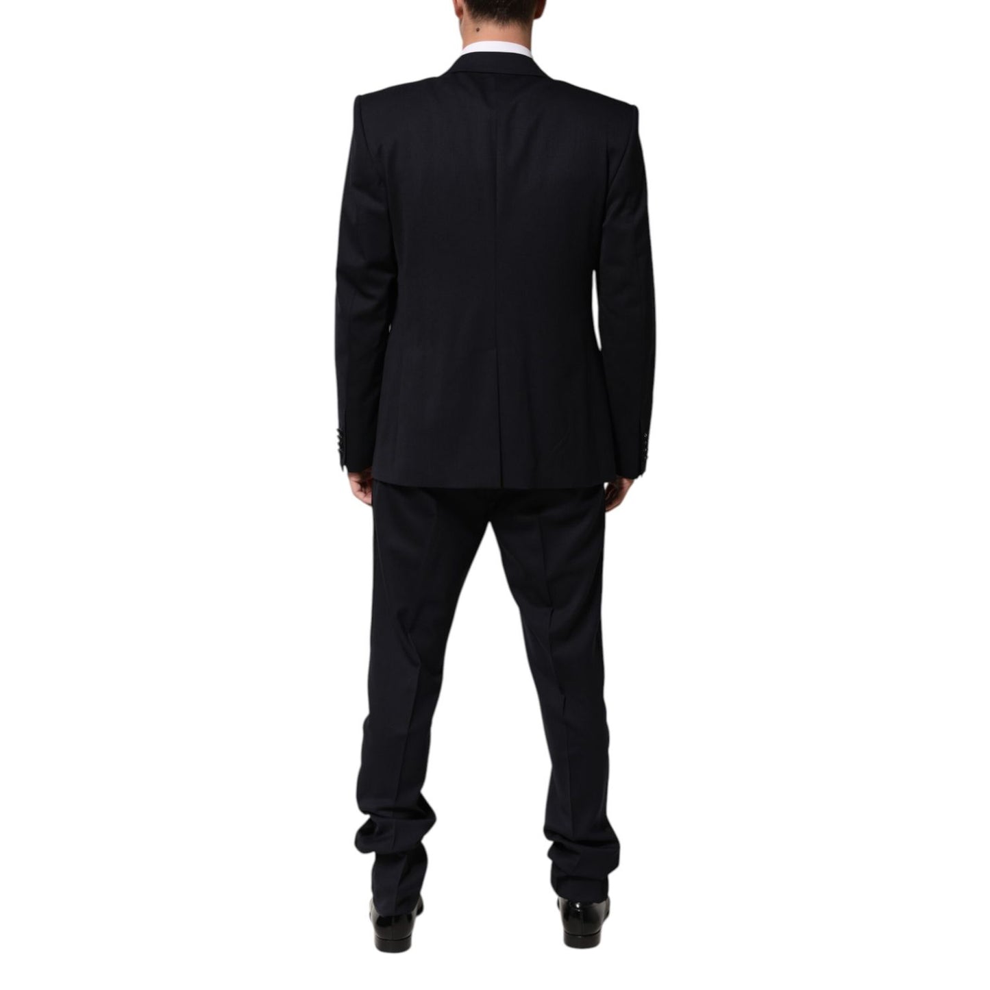 Back view of Dolce & Gabbana Black 3 Piece Wool Silk Blend Suit SICILIA, featuring elegant tailoring and satin peak lapels.