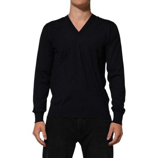 Dolce & Gabbana Black Cashmere Knit V-Neck Pullover Sweater on model, showcasing luxurious fabric and sophisticated V-neck design.