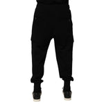 Back view of Dolce & Gabbana Black Cotton Blend Cargo Joggers Drawstring Pants with cuffed hems and cargo pockets.