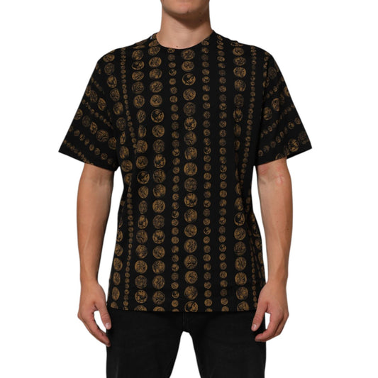 Dolce & Gabbana Black Cotton Coin Print Crew Neck T-shirt on model, showcasing distinctive coin design and premium Italian craftsmanship.