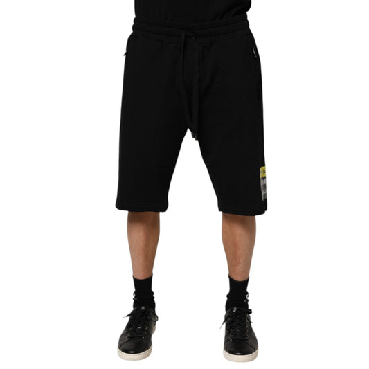 Dolce & Gabbana Black Cotton Mid Waist Casual Bermuda Short featuring drawstring closure and logo details, made in Italy.