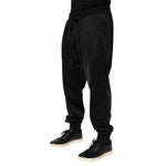 Dolce & Gabbana Black Polyester Logo Plaque Sweatpants Jogger Pants with elastic waistband and drawstring closure.