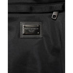Dolce & Gabbana Black Polyester Logo Plaque Sweatpants Jogger Pants showcasing metal logo plaque in back view.