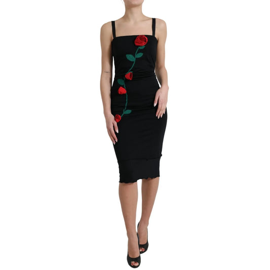 Dolce & Gabbana Black Wool Sleeveless Rose Applique Dress with red rose embroidery on model for formal occasions.
