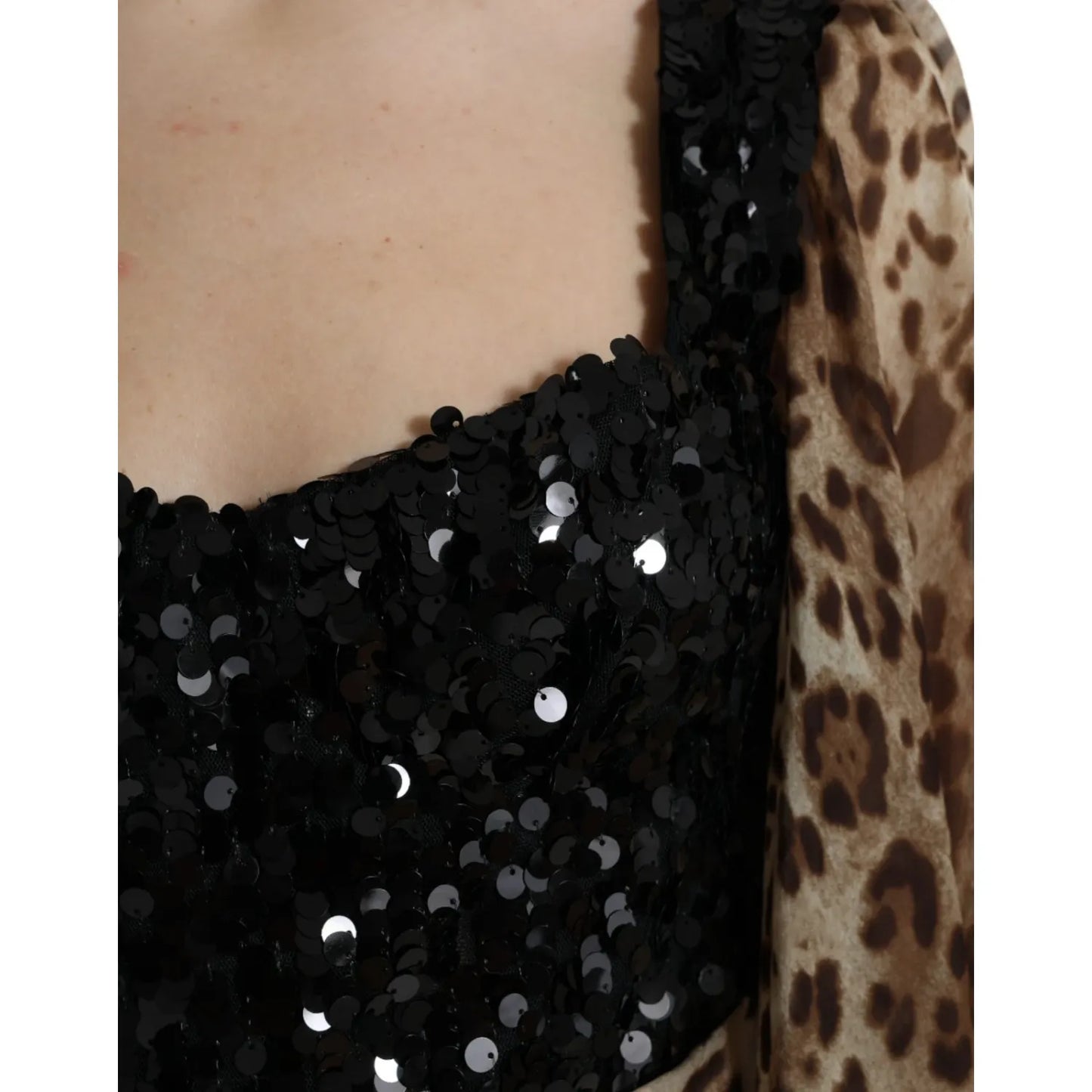 Dolce & Gabbana Leopard Print Silk Sequin Ruffle Maxi Dress bodice detail view with sequined design and leopard pattern sleeve.