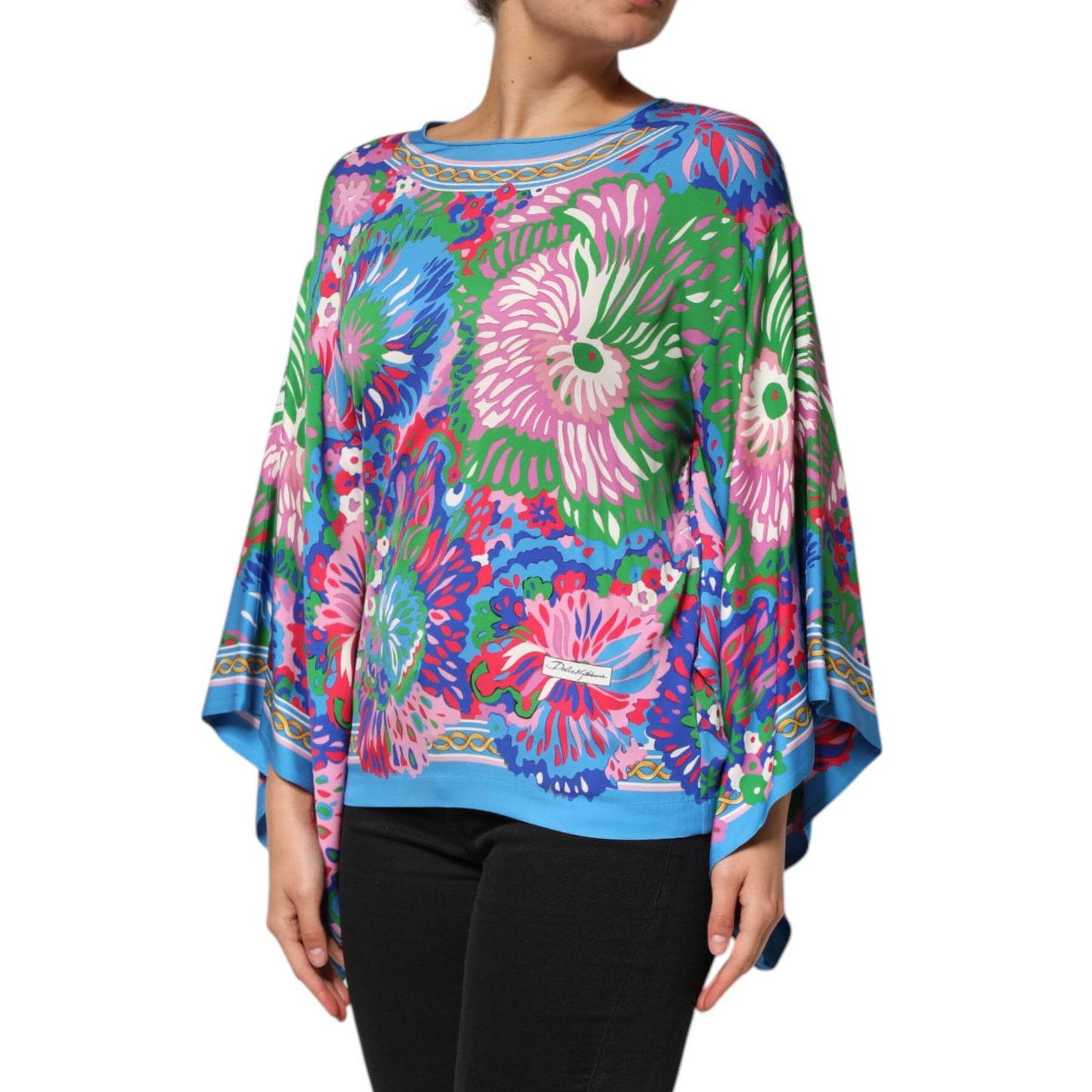 Dolce & Gabbana Multicolor Floral Print Silk Tunic Blouse Top featuring a vibrant floral design and relaxed silhouette.