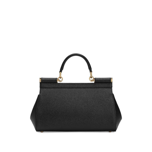 Dolce & Gabbana Sicily Medium Handbag in black leather with foldover top, push-lock fastening, and detachable shoulder strap.