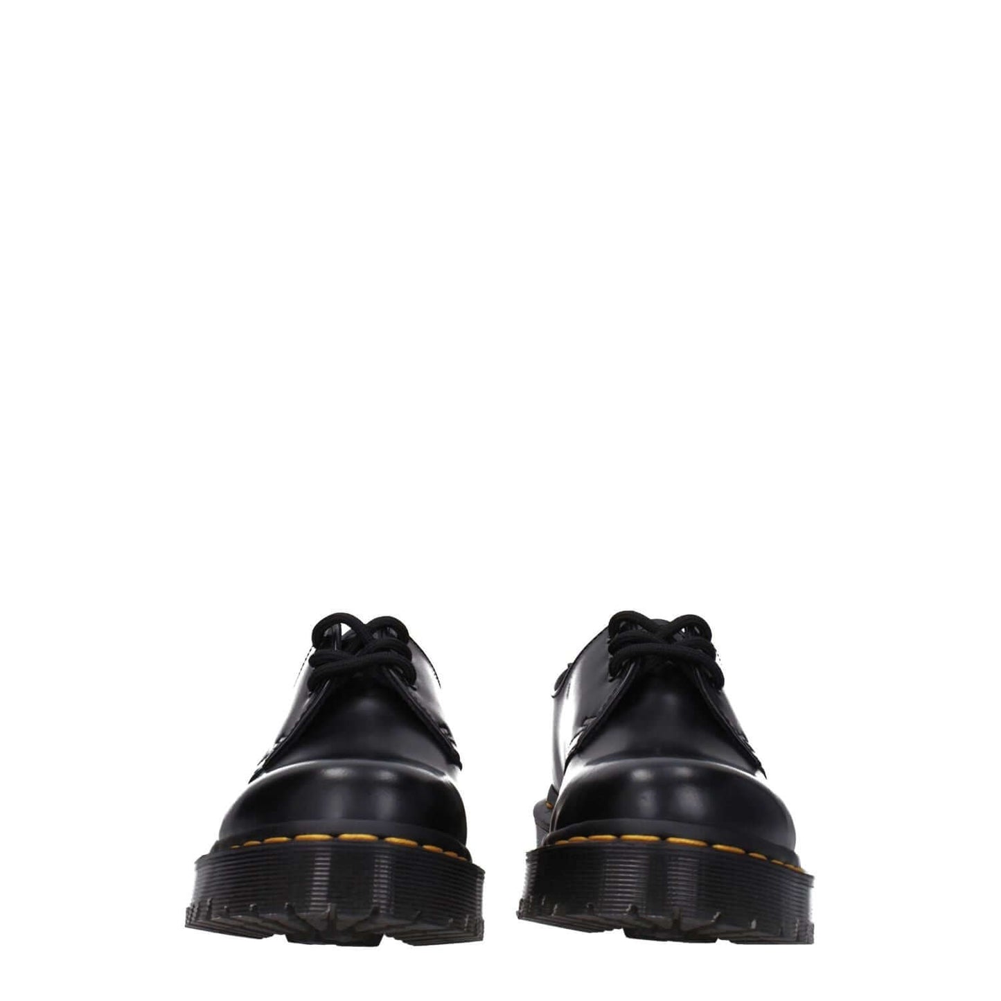 Alt Tag: Dr. Martens Black Leather Oxfords And Derbies with rubber soles and lace-up design, front view displaying casual style footwear.
